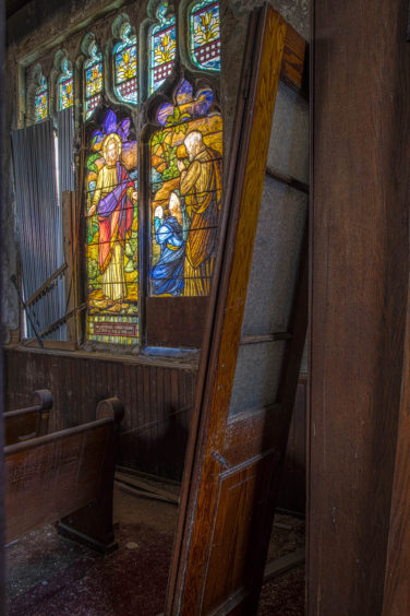 This is the entrance to the sanctuary of an abandoned church in Chester Pennsylvania