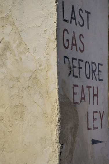 Sign at abandoned garage in Death Valley Junction California