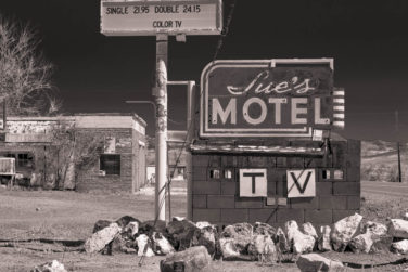 Sign for abandoned Sue's Motel in Mina Nevada