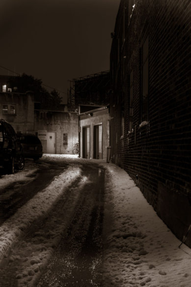 Snowy alley at night in Ardmore Pennsylvania