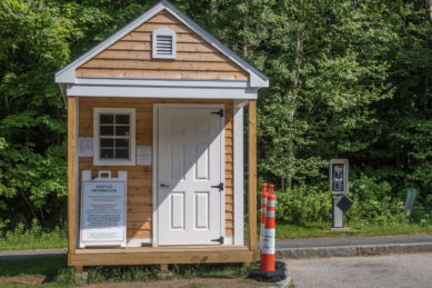 Pay telephone and shuttle bus stop in Franconia Notch New Hampshire