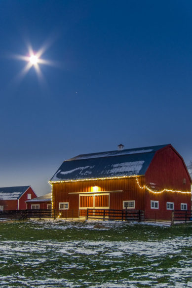Frying Pan Farm Park barn with Christmas lights and moon in Herndon Virginia