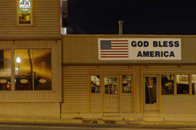 Restaurant in Herndon Virginia with Flag Sign and S&H Greenstamp Sign