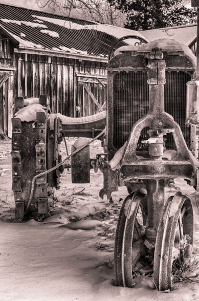Tractor in snow at farm in Sterling Virginia
